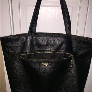 Onna Ehrlich black pebbled leather tote.